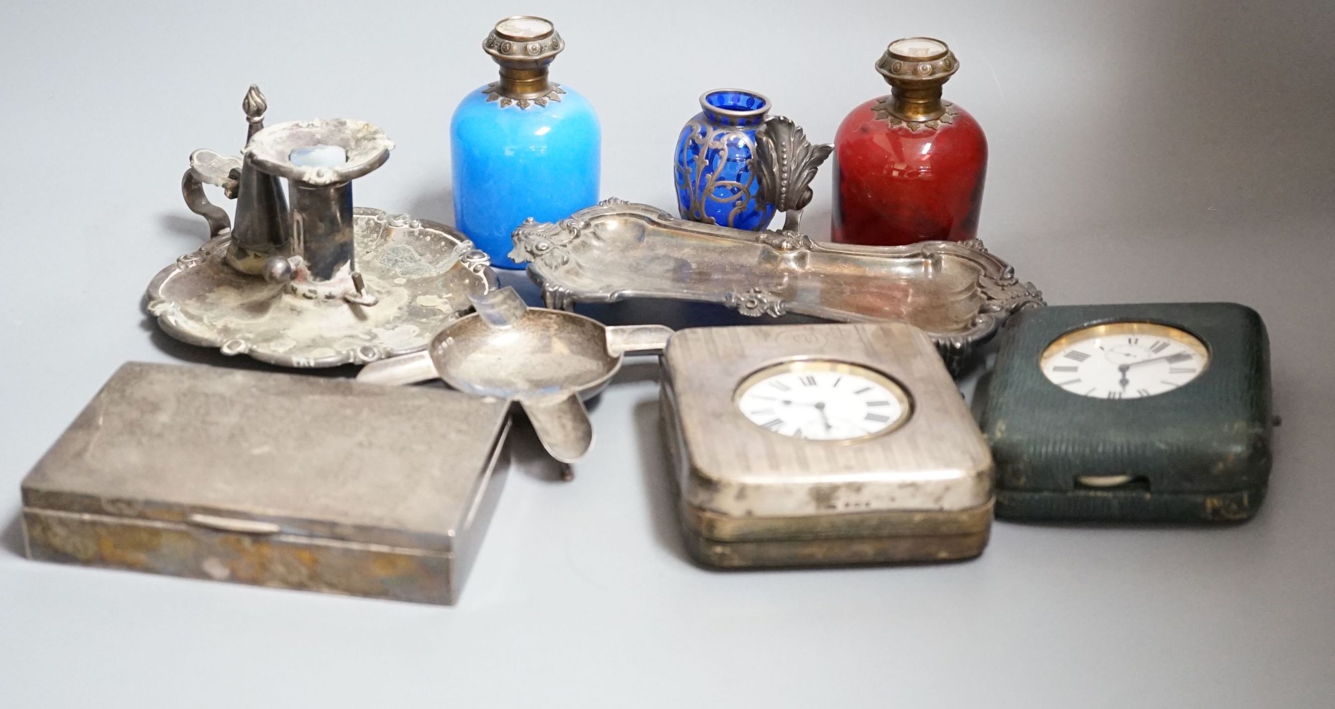 An Edwardian silver mounted travelling pocket watch case with 8-day pocket watch, one other