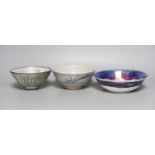 Two studio pottery bowls and a Chinese blue and white bowl, largest 18cm