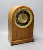 A late Victorian walnut mantel clock, French movement with pendulum, 35cm