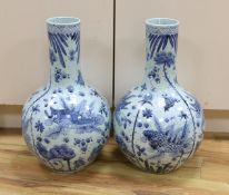 A pair of large Chinese vases, coy carp and floral,56cms high.