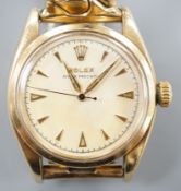 A gentleman's 1950's 9ct gold Rolex Oyster Precision manual wind wrist watch, with honeycomb dial