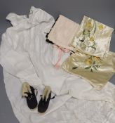 A pair of felt fur-lined child's boots and a whitework communion dress, a handkerchief sachet and