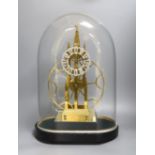 A brass skeleton fusee mantel timepiece, under glass dome on stand,49cms high.