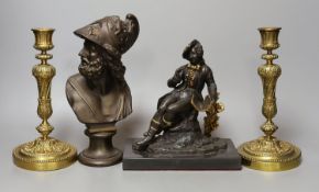 A pair of cast brass candlesticks, 22cm, a bearded portrait bust and a seated figure