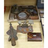 A box of curios including ship's log, brass projectile arrow and postal scales