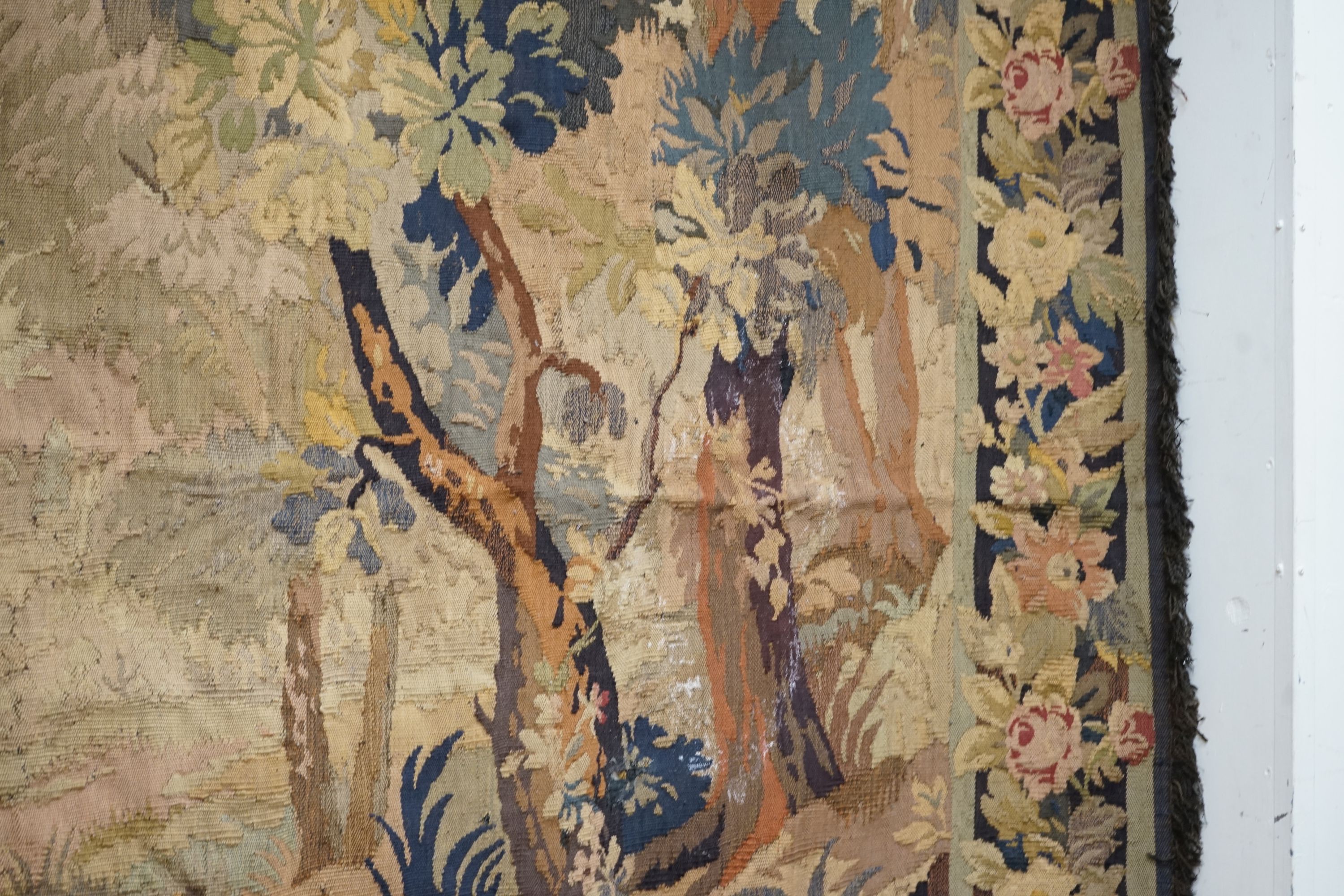 A late 19th / early 20th century French tapestry depicting a woodland scene with trees and flowers - Image 9 of 9