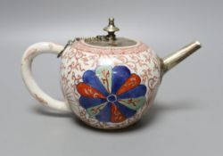 A Chinese Kangxi white metal-mounted porcelain teapot 19cm long