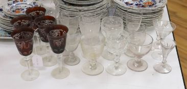 A collection of mostly 19th century rummers and ruby etched glass wine glasses, flutes etc.