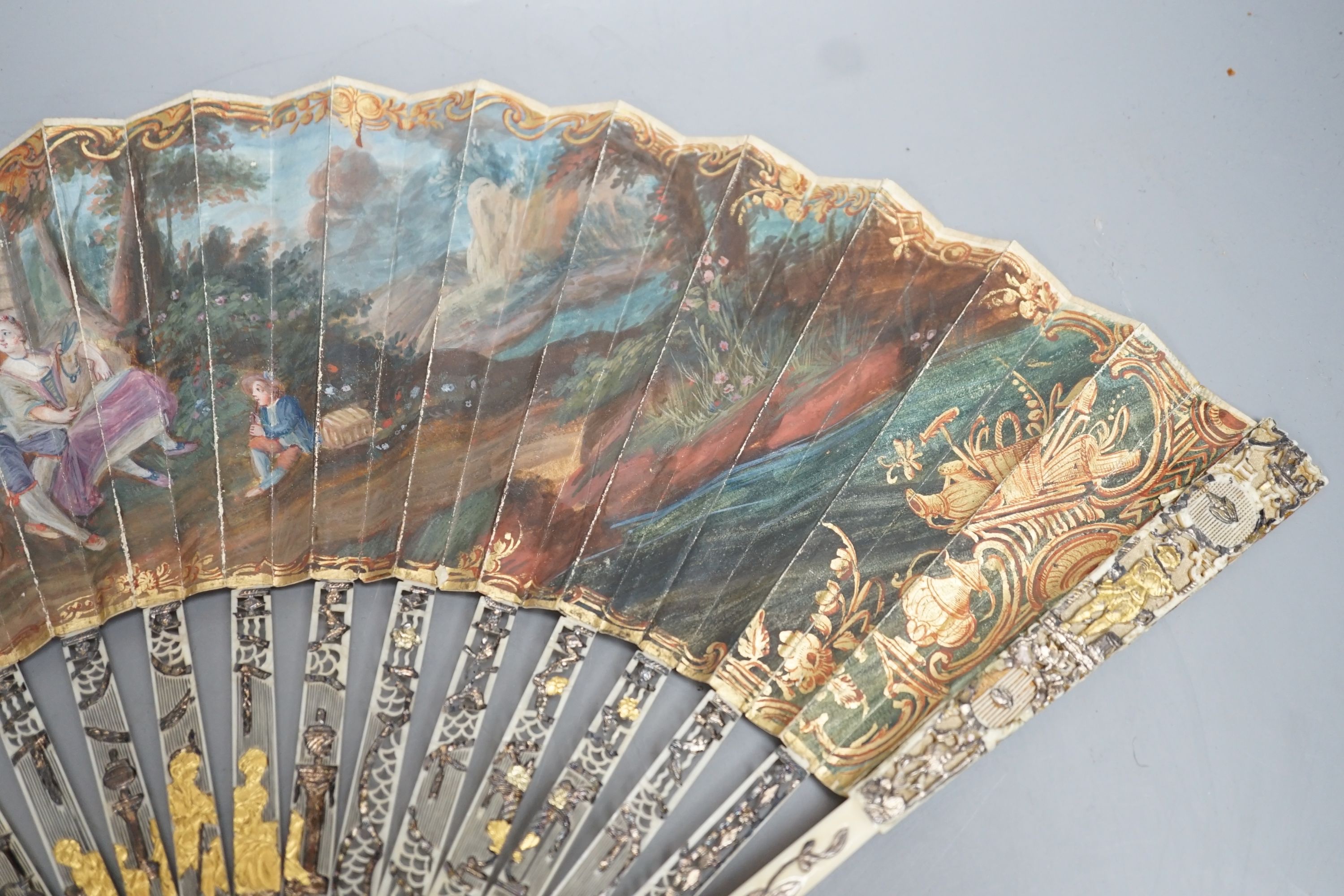 Two late 18th/early 19th century French gilded and silvered ivory and painted paper leaf fans - Image 7 of 9