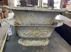 A pair of cast iron garden planters, width 65cm, depth 34cm, height 26cm