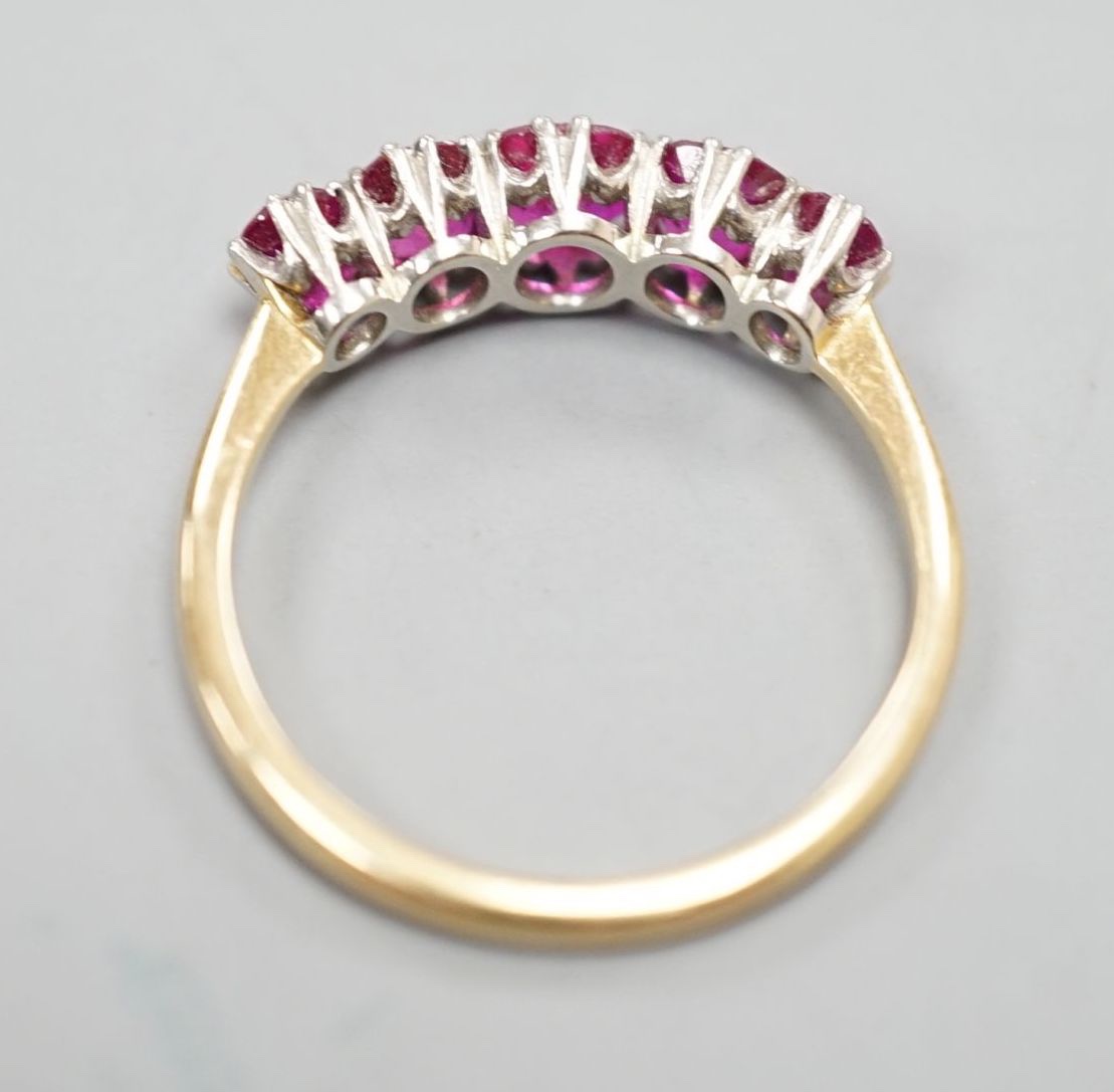 An early 20th century 18ct and plat, graduated five stone ruby set half hoop ring, size Q, gross - Image 3 of 3