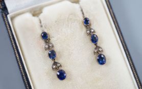 A pair of late Victorian 9ct, three stone sapphire and four stone rose cut diamond set drop