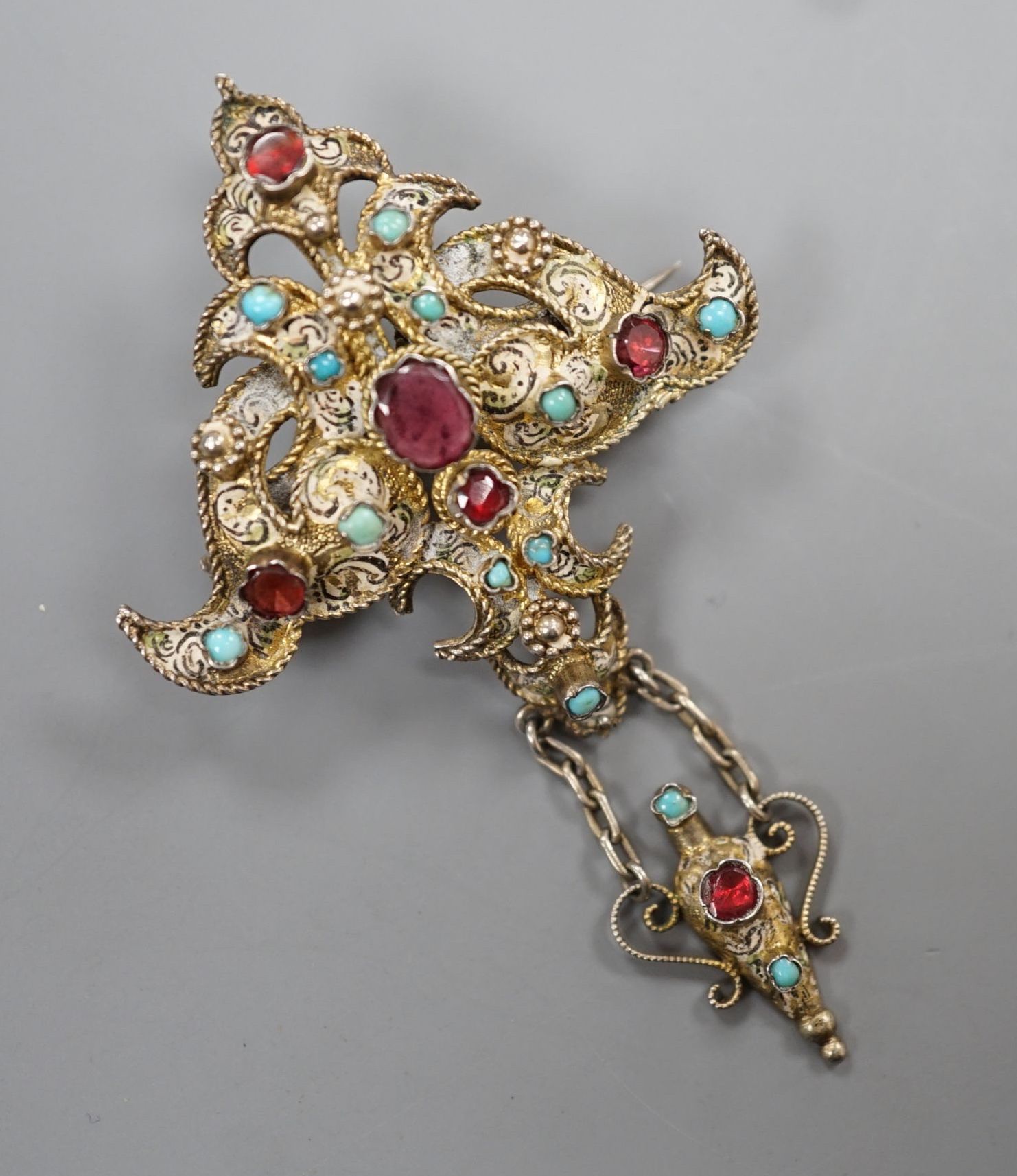 A 19th century Austro-Hungarian gilt white metal and semi-precious gem set drop brooch, 6cm.