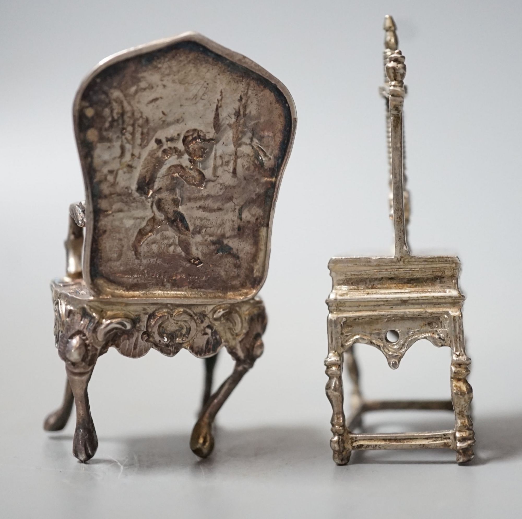 An Edwardian silver miniature model of an armchair, import marks for Glasgow, 1902, 64mm and a white - Image 3 of 3