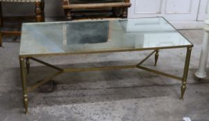 A Maison Jensen style rectangular brass coffee table with mirrored glass top, length 100cm, depth