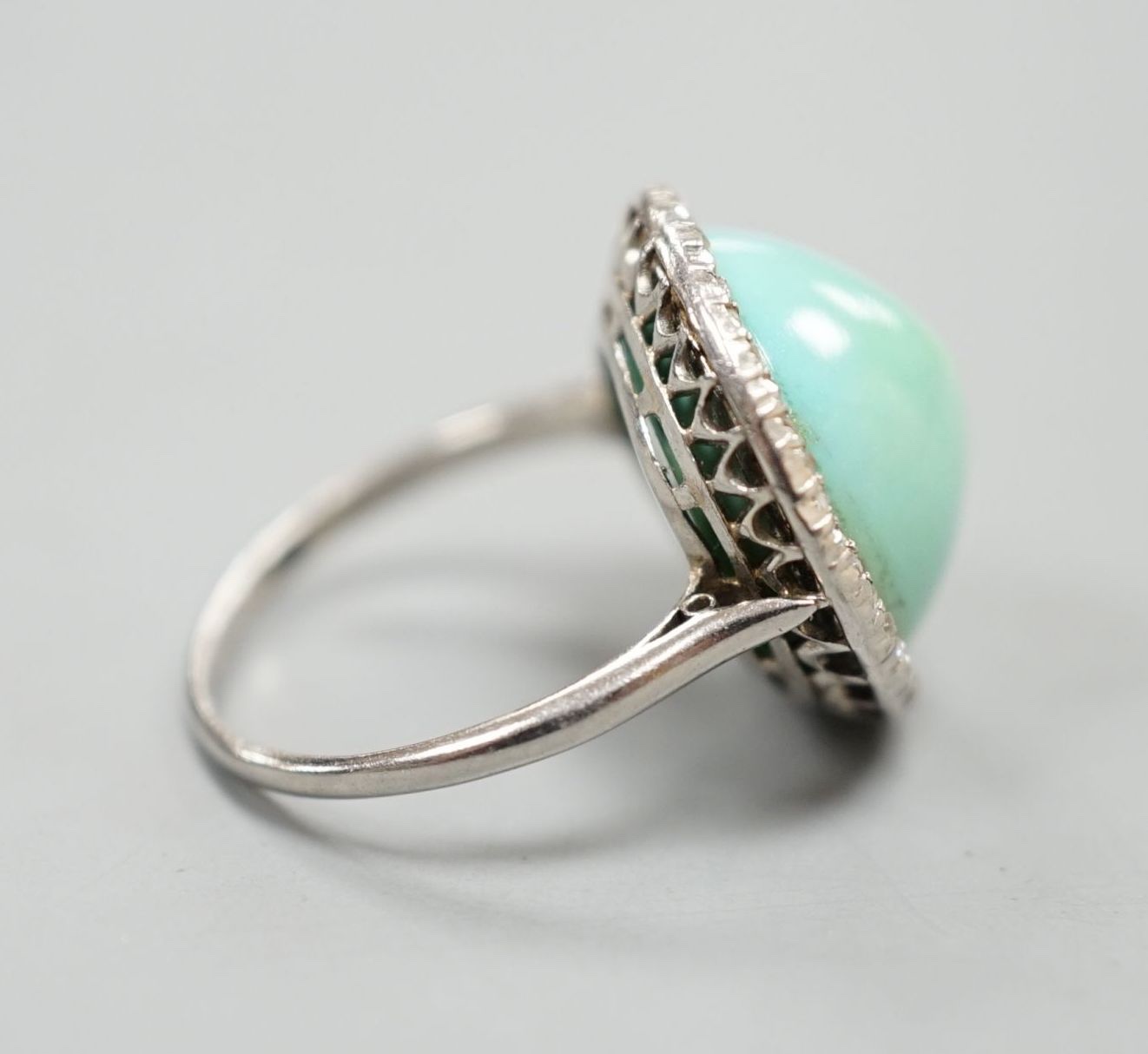 A white metal cabochon turquoise and diamond chip set dress ring, size J/K, gross 6.9 grams. - Image 3 of 4