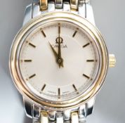 A lady's steel and gold plated Omega quartz wrist watch, on steel and gold plated Omega bracelet,