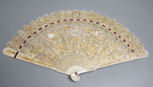 A 19th century Chinese export pierced ivory brise fan, gilded sticks, 19cm