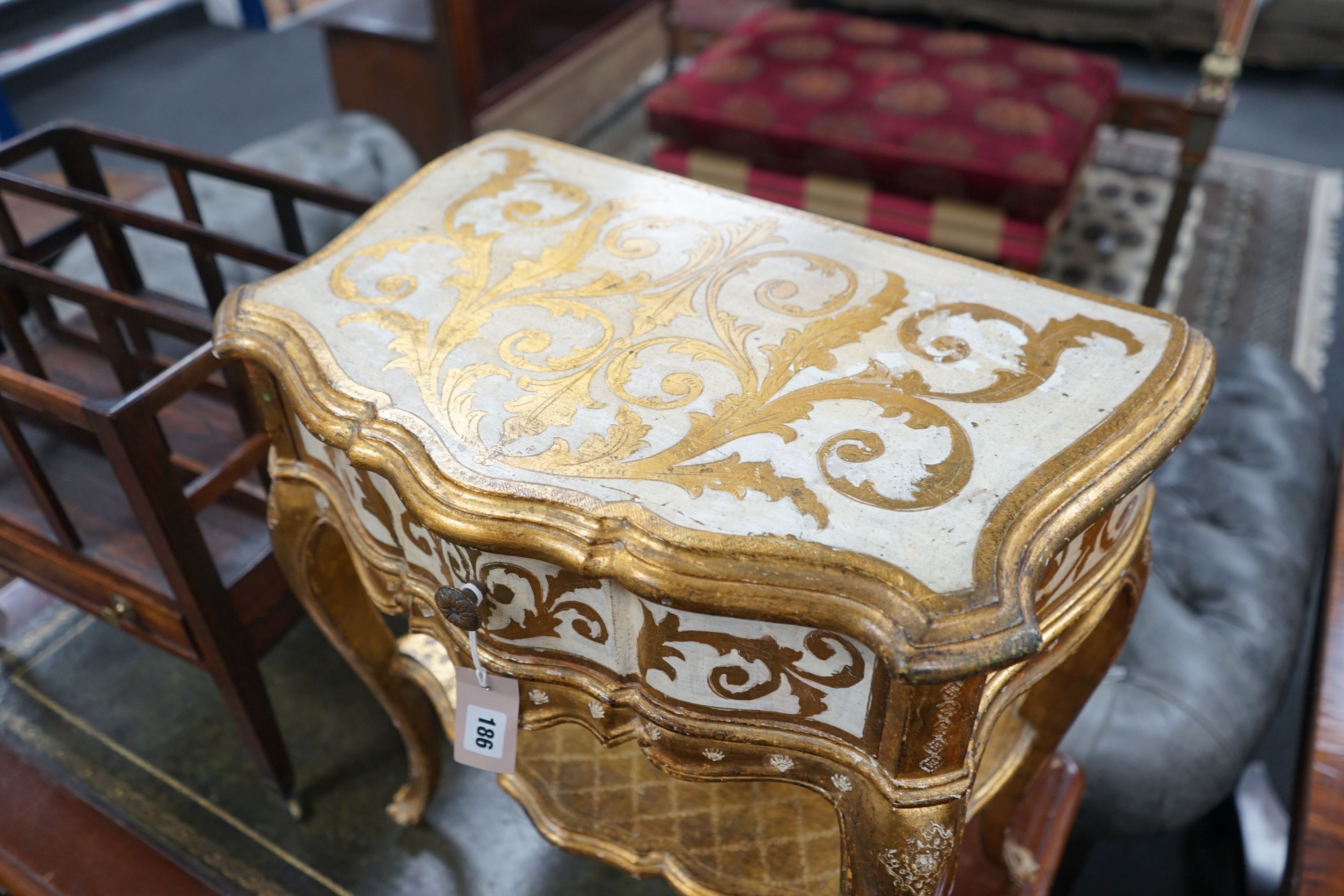 A Florentine gilt and cream painted serpentine two tier side table, width 50cm, depth 34cm, height - Image 3 of 4