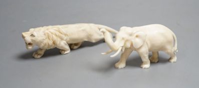 A Japanese Ivory model of an elephant and a similar Ivory model of a lion, early 20th century (2)