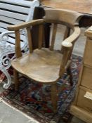 A late Victorian elm and beech smoker's bow chair, width 60cm, depth 50cm, height 80cm