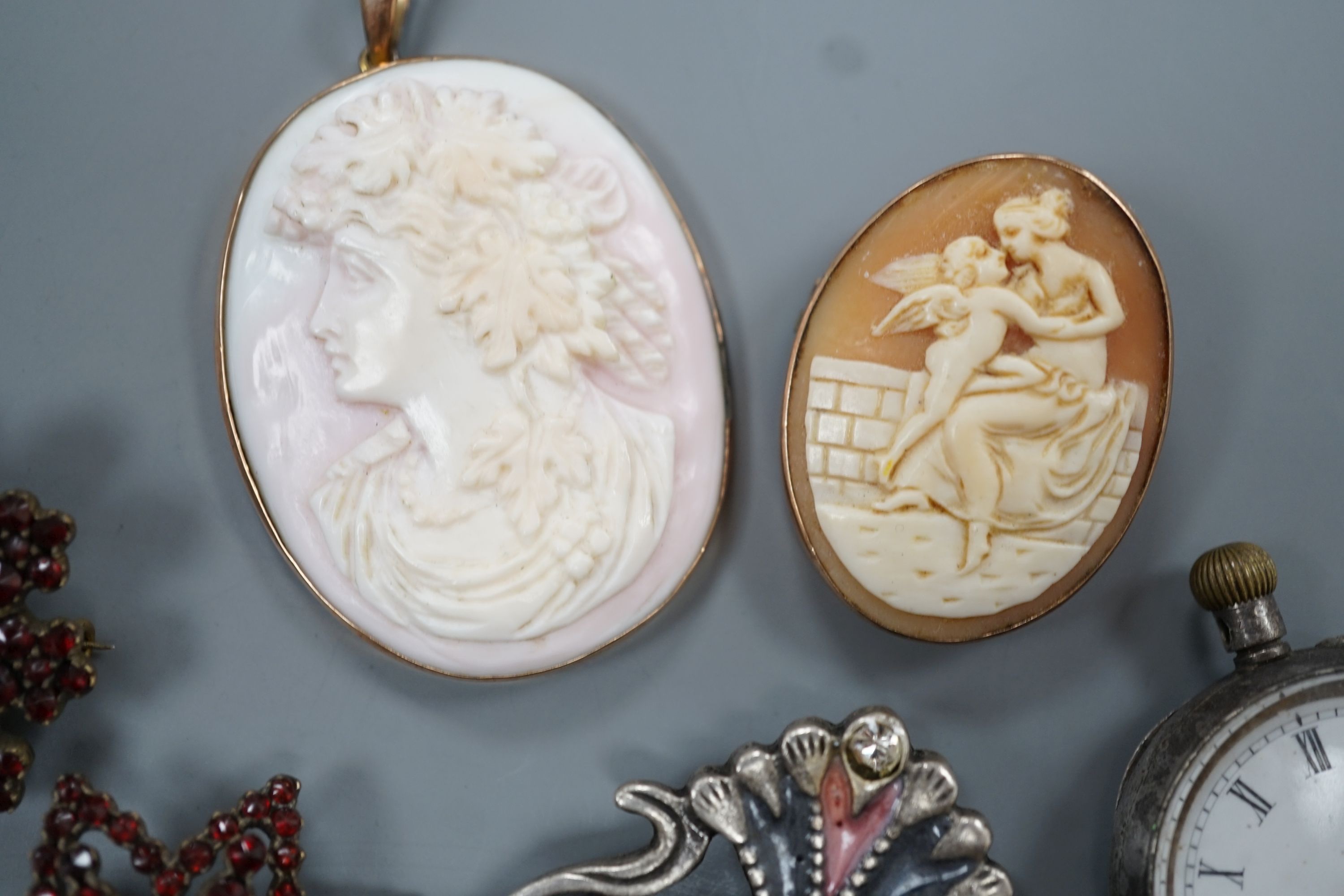 A yellow metal mounted cameo shell brooch and a similar pendant, two brooches, a white metal fob - Image 2 of 5