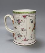 An 18th century Chinese export famille rose mug, 16cm