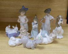 A selection of Lladro and Nao figures