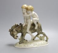 A Hutschenreuter porcelain group of two boys riding a donkey - 21.5cm tall