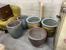 Two pairs of Chinese glazed terracotta circular jardinieres and one other (5), largest diameter