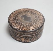 A 19th century yellow metal inlaid circular box and cover 8cm diameter