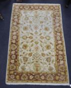 A Ziegler style ivory ground rug, 188 x 122cm