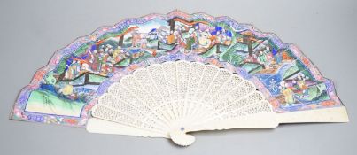 A 19th century Chinese export pierced ivory and painted paper leaf fan. 28cm long