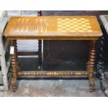 A Victorian inlaid rectangular walnut games table with chess and backgammon surface, width 87cm,