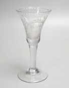 A Georgian wine glass, possibly later engraved ‘Beauty, Chastity, and Love above a lily, heart and
