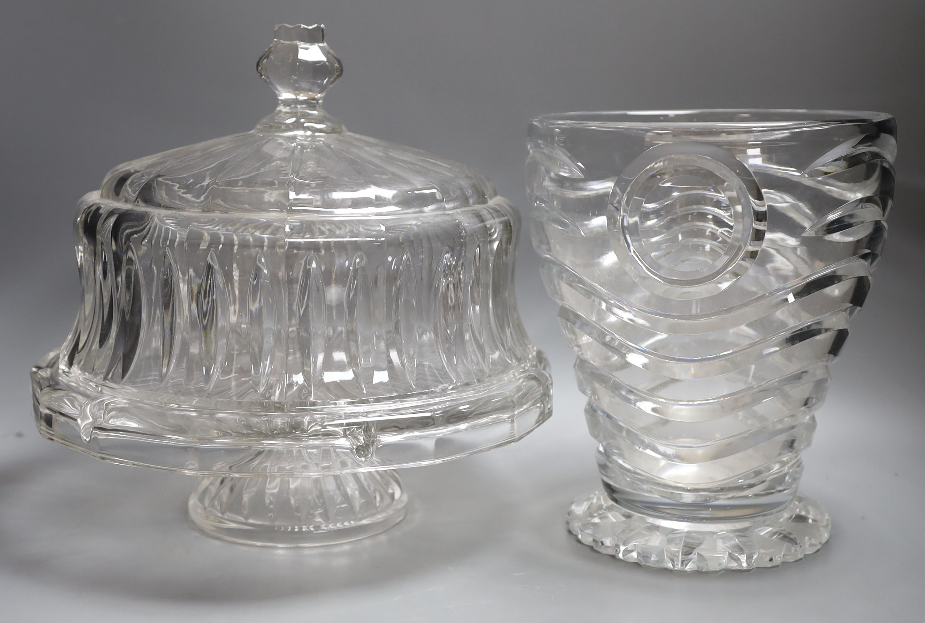 A large cut crystal cake stand together with a wave cut vase, 25cm tall, (2)