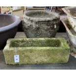 A circular reconstituted stone garden planter, diameter 38cm, height 32cm together with a smaller