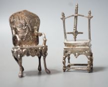 An Edwardian silver miniature model of an armchair, import marks for Glasgow, 1902, 64mm and a white