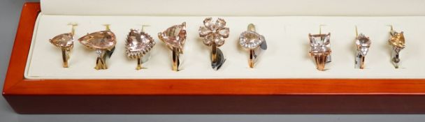 Eight assorted modern 9ct gold and morganite set dress rings and a 925 and gem set ring,9ct gross 22