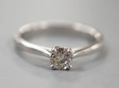 A modern platinum and solitaire diamond ring, size Q/R, gross weight 5.4 grams,stone diameter 4.