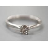 A modern platinum and solitaire diamond ring, size Q/R, gross weight 5.4 grams,stone diameter 4.