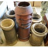 Five earthenware pottery chimney pots, largest height 92cm