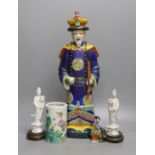 A Chinese brush pot, a pair of blanc de chine deities, a famille rose early 20th century figure, and