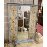 A reproduction 19th century style rectangular polychrome floral wall mirror, width 126cm, height