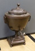 After Alex Decaix - A Regency copper tea urn, with classical caryatid mask and ring handles, 48