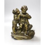 A Victorian cast bronze child figure group - 17cm tall