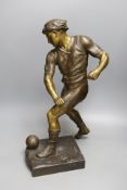 A bronzed spelter figure of a footballer after Picault - 50cm tall