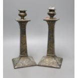 A pair of Japanese square footed embossed plated candlesticks, c.1900, 23cm tall