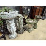 A circular reconstituted stone figural garden planter, diameter 48cm, height 82cm together with