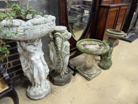 A circular reconstituted stone figural garden planter, diameter 48cm, height 82cm together with